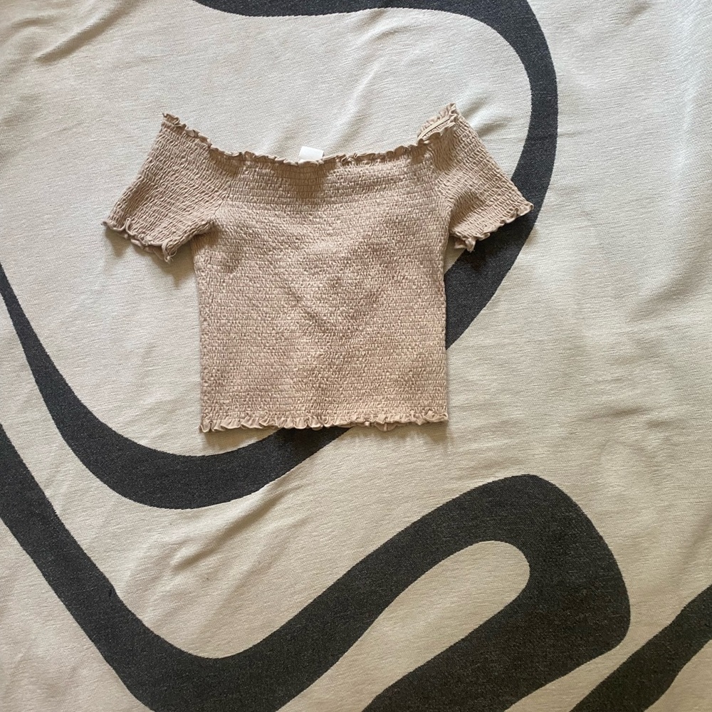 Tan crop